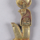 An ancient Egyptian pendant depicting Khonsu as a falcon.